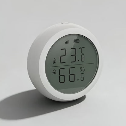 Zigbee temperature and humidity sensor with LCD display showing real-time readings in a smart home setup